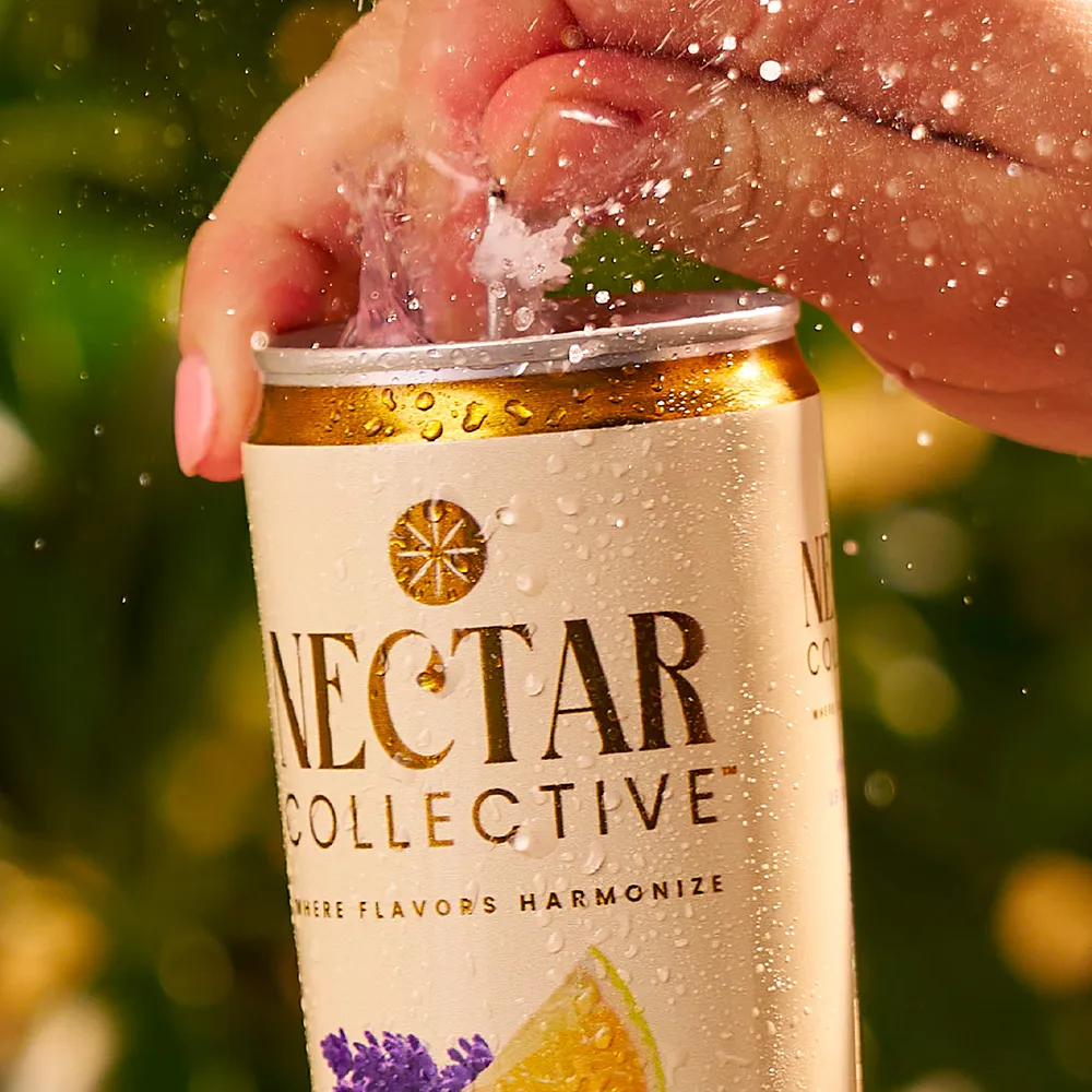 Hand Opening Can Splash Golden Light Nectar